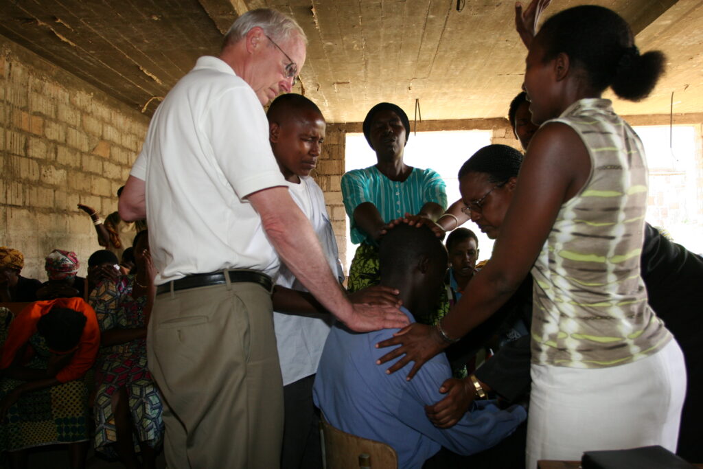 Don Miller at a religious service in Rwanda, where he has studied the role of religion in the country's recovery from genocide. 