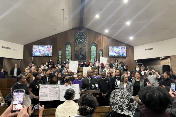 group of faith leaders gather in church